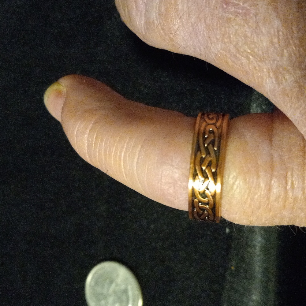 Copper and magnets wellness ring. Adjust to most sizes